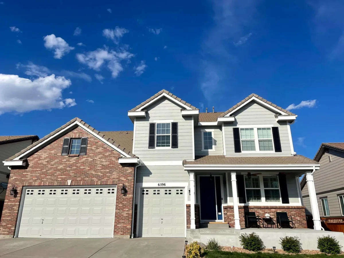 Exterior house painting on a two-story Castle Rock home