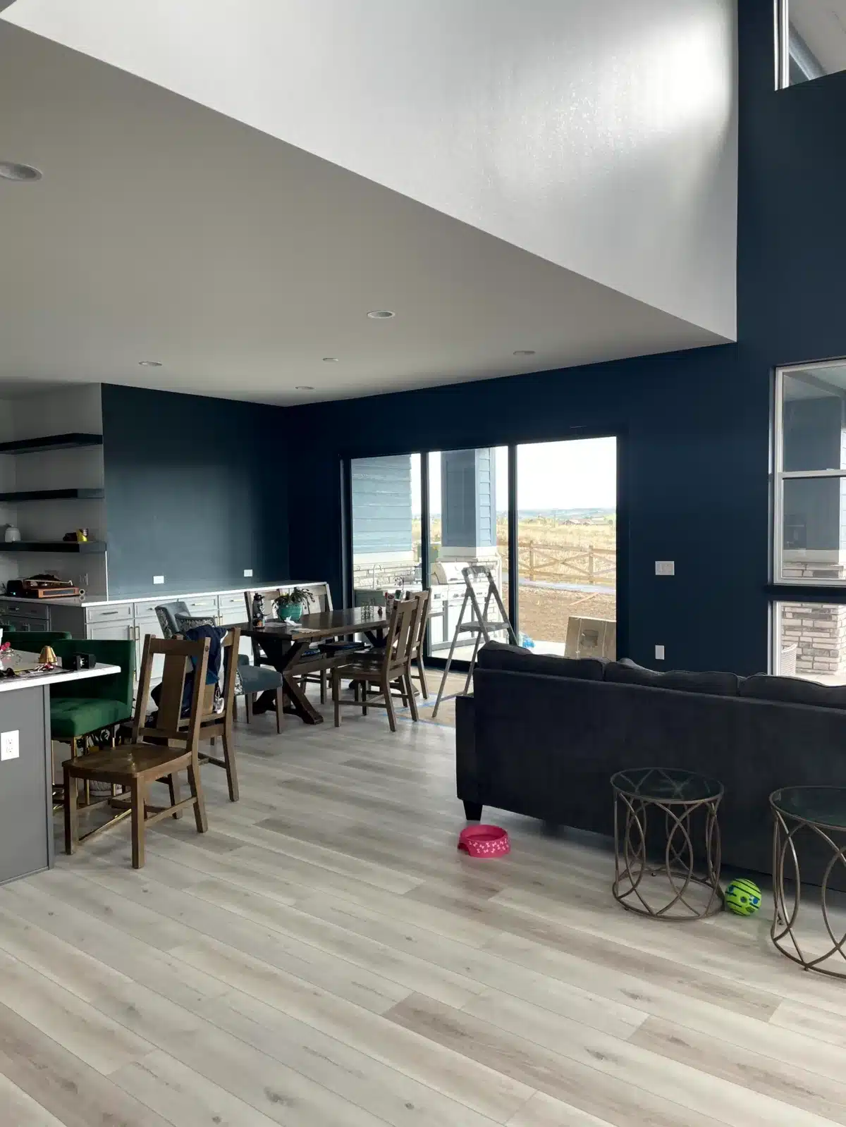Interior house painting with a navy accent wall in Colorado