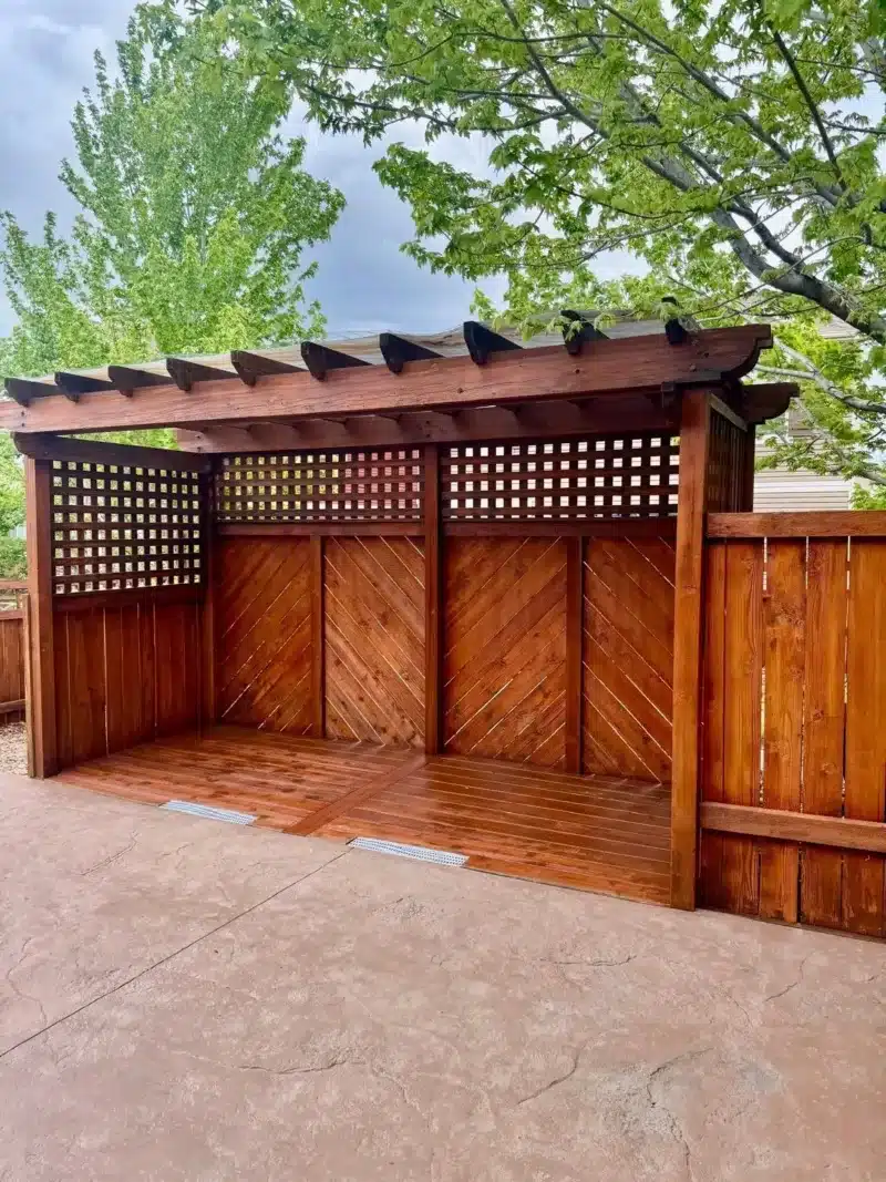 Deck and fence painting and staining in a Colorado backyard